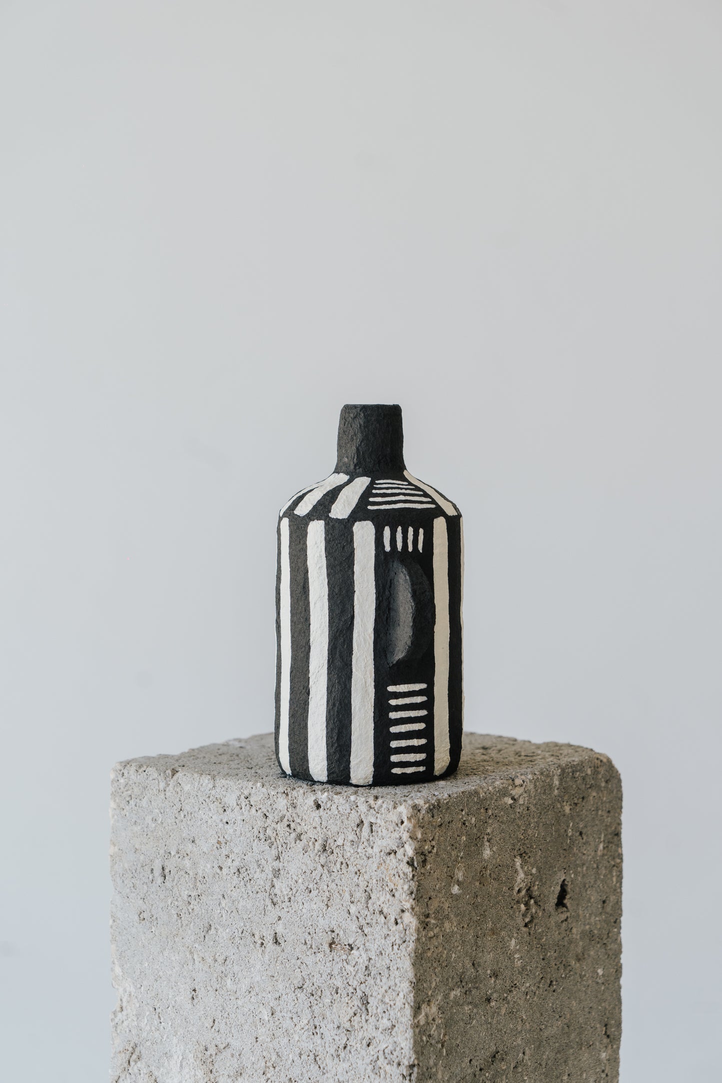 Black Vase with White Stripes