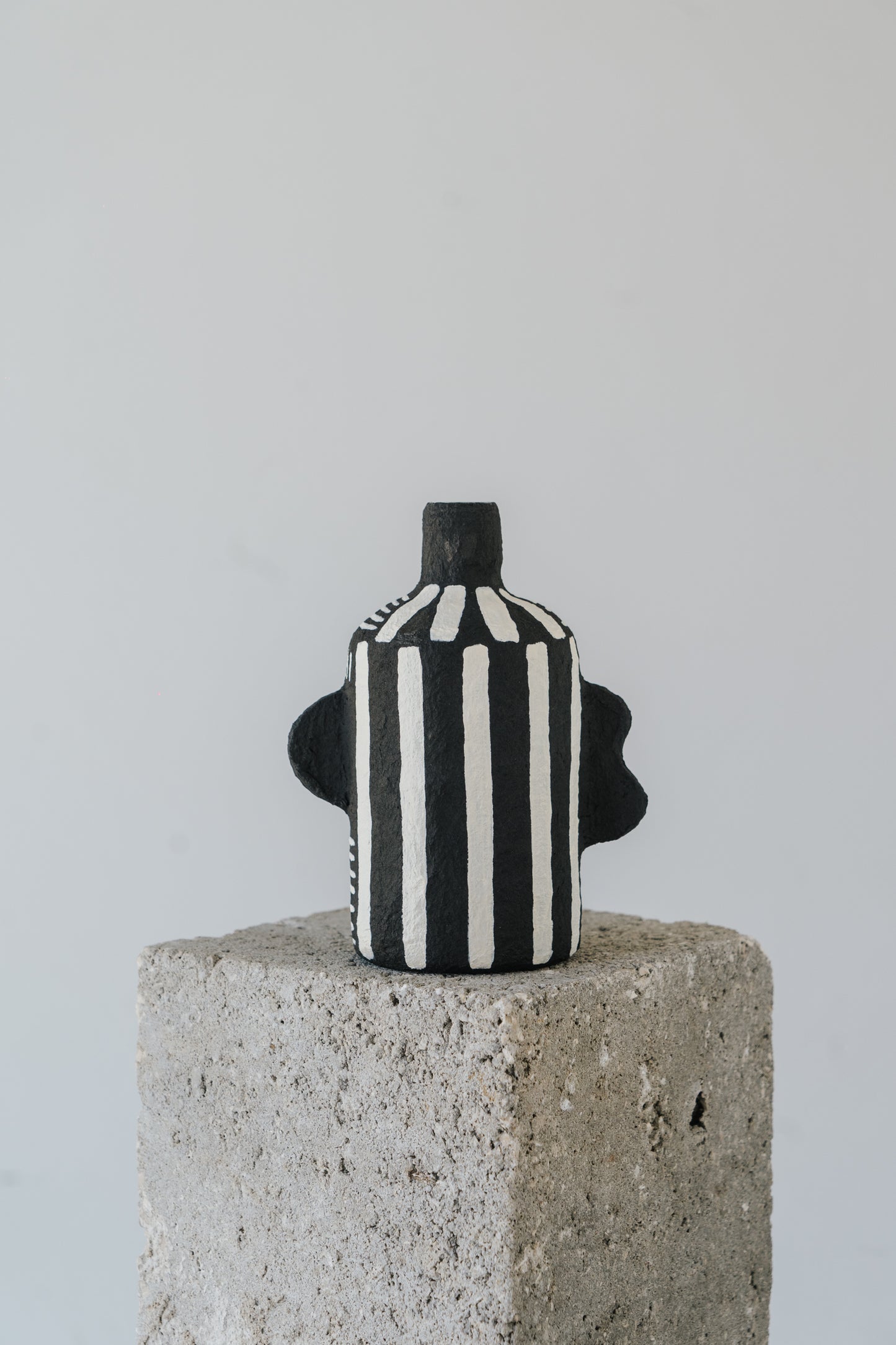 Black Vase with White Stripes