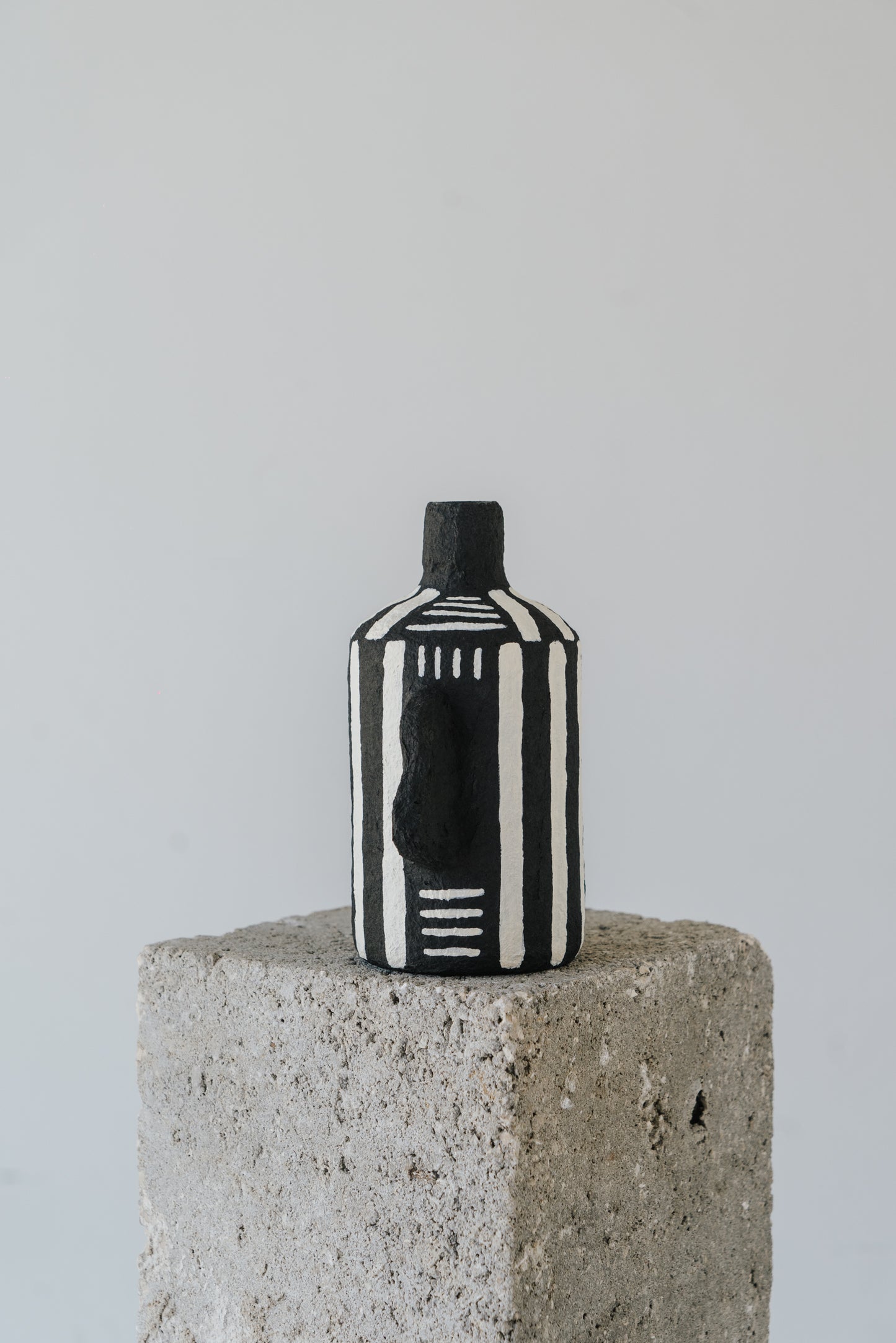 Black Vase with White Stripes