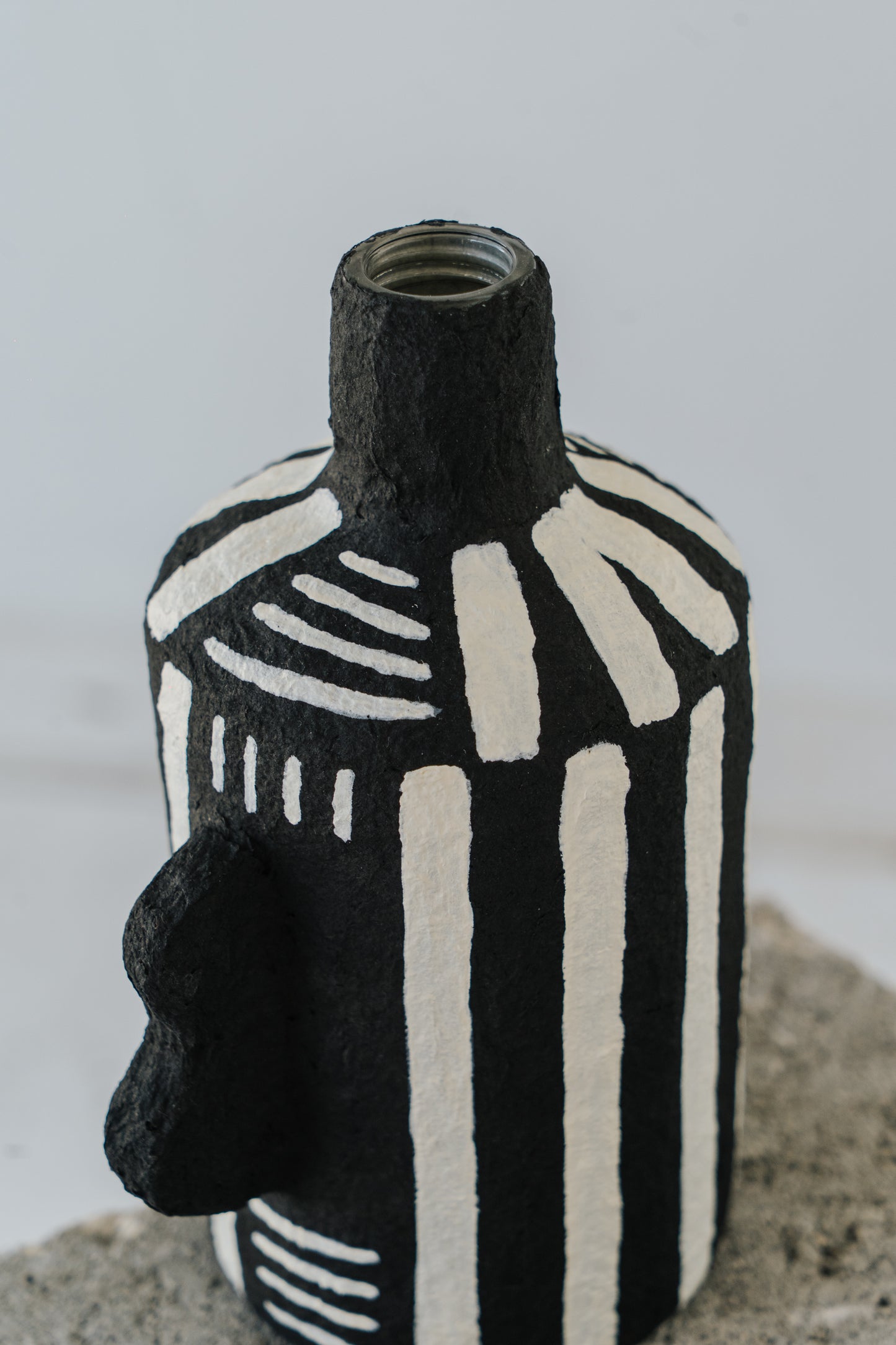 Black Vase with White Stripes